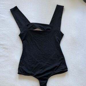 free people “oh she’s strappy” bodysuit